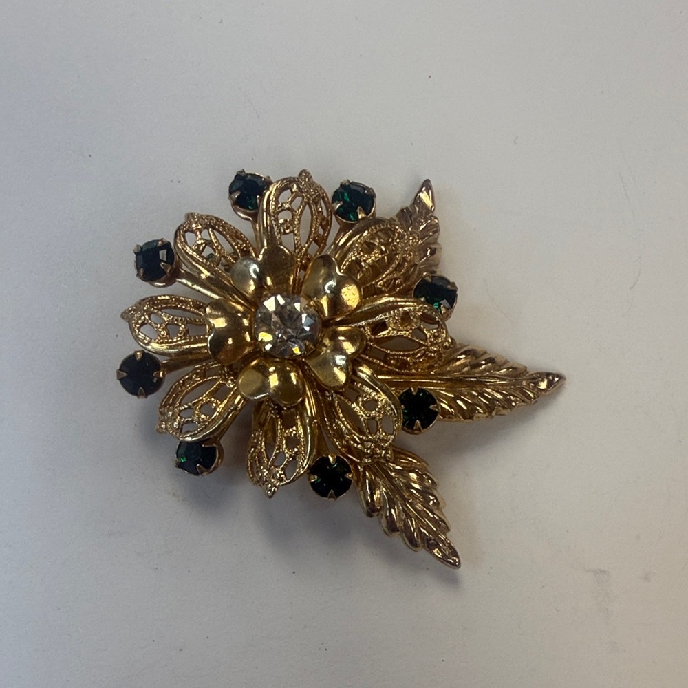 Gold Flower Brooch with Green Accent Stones - Elegant Women's Jewelry